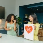 Women Promoting Healthy Eating in Kitchen